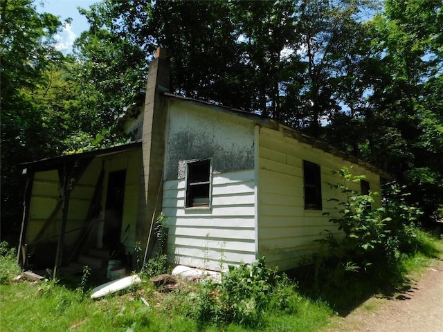 15954 Parsons Ln, Edinboro, PA 16412 - view of home's exterior featuring a chimney