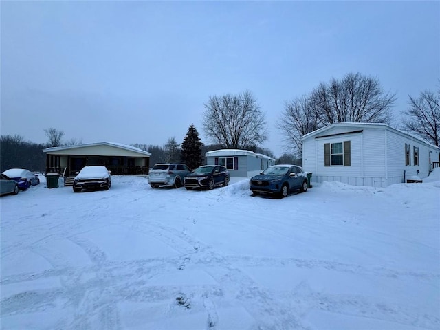 view of yard covered in snow