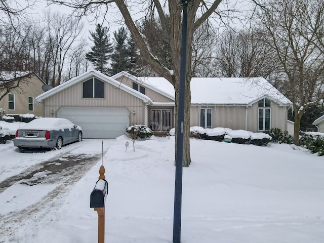 single story home with a garage