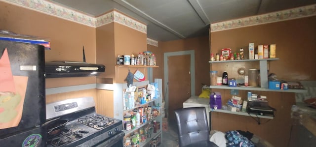 kitchen with range hood and black appliances