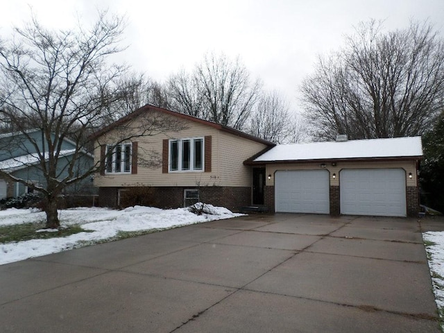 split level home featuring a garage