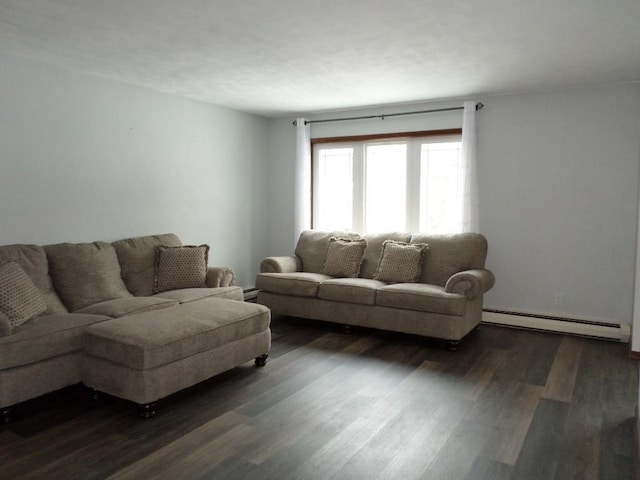 living room with dark hardwood / wood-style flooring and baseboard heating