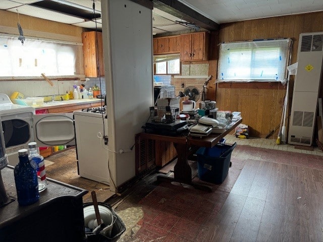 kitchen featuring washer / clothes dryer and heating unit