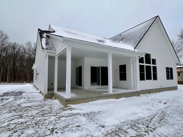 view of snow covered property