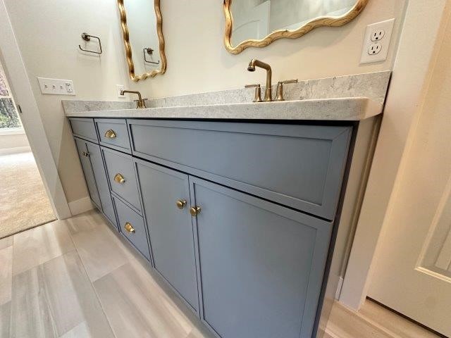 4655 Elsie Rd Unit 1, Erie, PA 16511 - bathroom with double vanity and tile patterned flooring