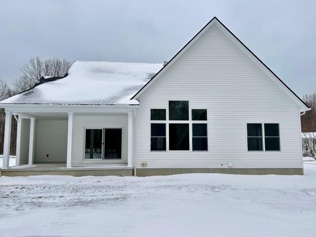 view of snow covered house