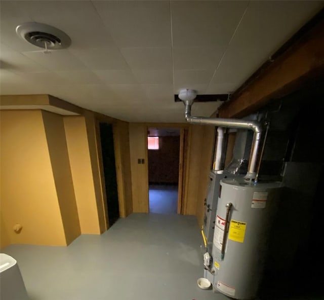 basement featuring gas water heater