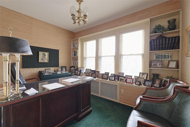 carpeted office with a notable chandelier