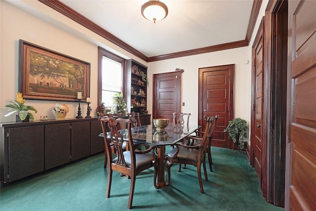 carpeted dining space featuring crown molding