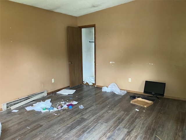 4015 Longview Ave, Erie, PA 16510 - unfurnished room featuring baseboard heating, wood finished floors, and baseboards