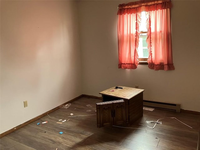 4015 Longview Ave, Erie, PA 16510 - spare room with a baseboard radiator, baseboards, and wood-type flooring