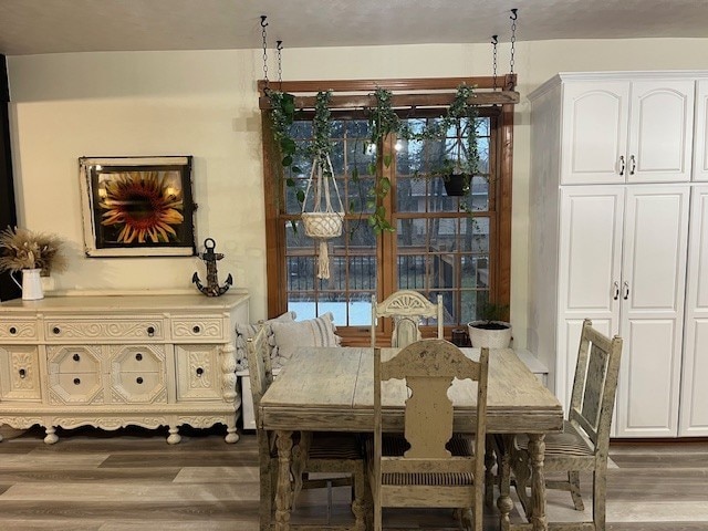 dining area featuring wood finished floors