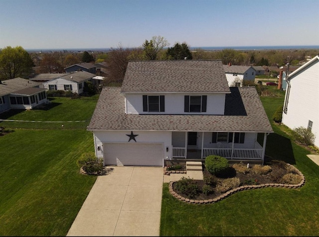 816 E Grandview Blvd, Erie, PA 16504 - view of front of property with covered porch, concrete driveway, a front yard, and a residential view