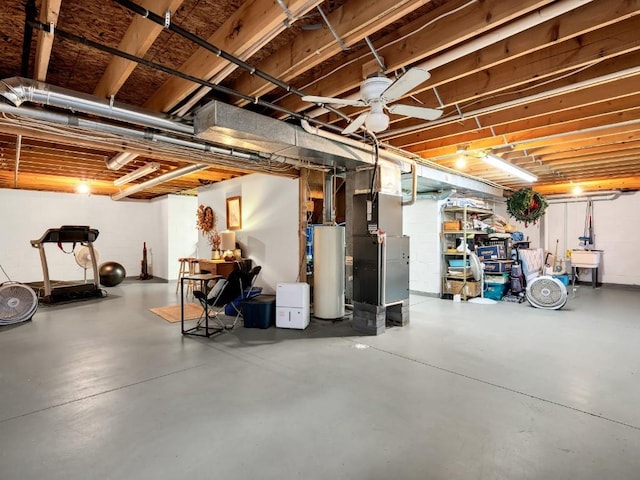 unfinished below grade area with heating unit, a sink, and gas water heater