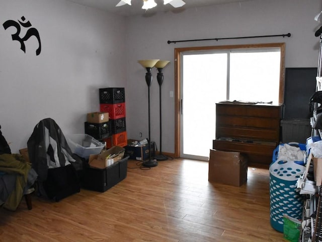 interior space featuring ceiling fan and wood finished floors