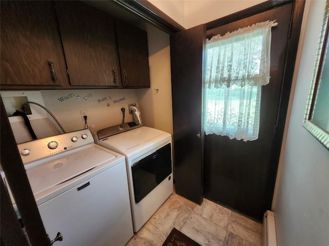 laundry room featuring separate washer and dryer, baseboard heating, and cabinet space