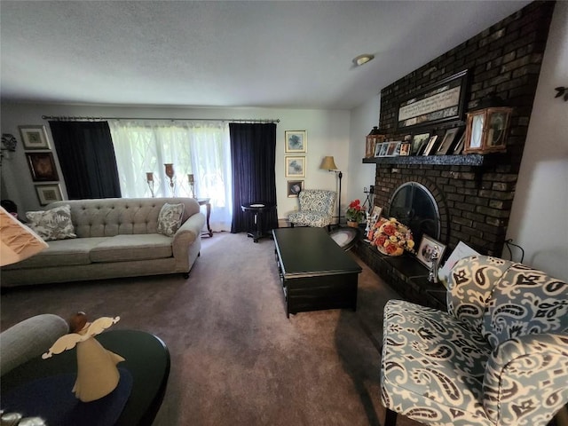 living room featuring a brick fireplace and dark carpet