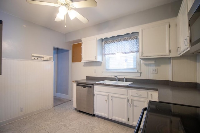 kitchen featuring white cabinetry, ceiling fan, appliances with stainless steel finishes, and sink