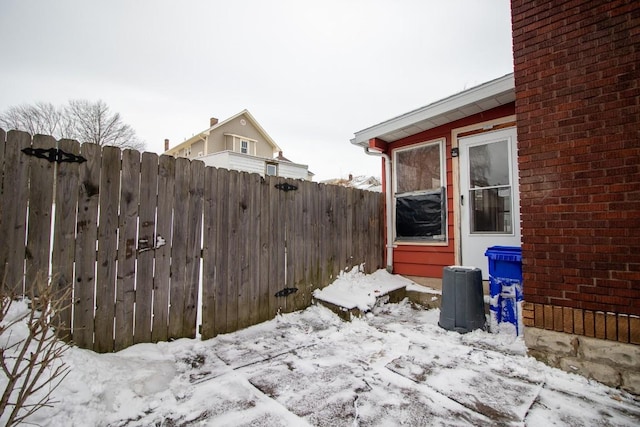 view of yard layered in snow