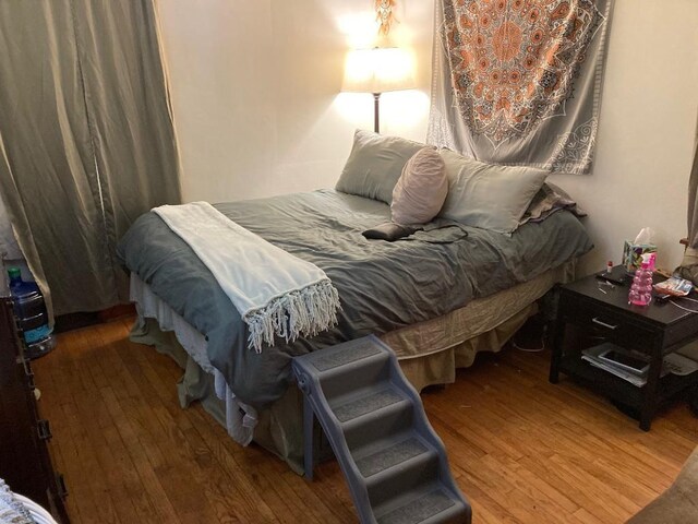 bedroom featuring hardwood / wood-style flooring