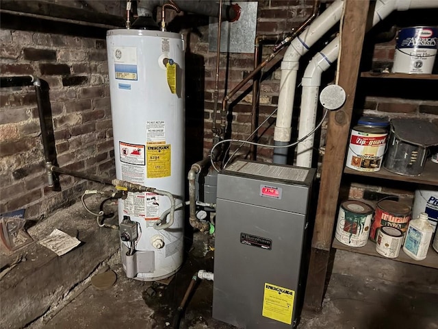 utility room featuring gas water heater