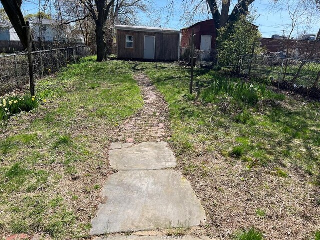 539 W 3rd St, Erie, PA 16507 - view of yard with an outdoor structure and fence