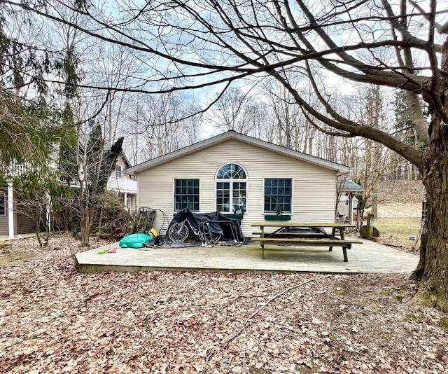 13478 Old Lake Rd Unit 63, East Springfield, PA 16411 - rear view of property with a wooden deck