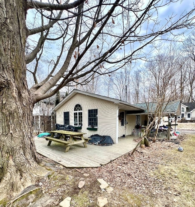 13478 Old Lake Rd Unit 63, East Springfield, PA 16411 - rear view of property with a deck