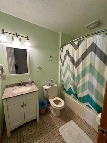 full bathroom with toilet, vanity, tile patterned flooring, shower / bathtub combination with curtain, and a textured ceiling