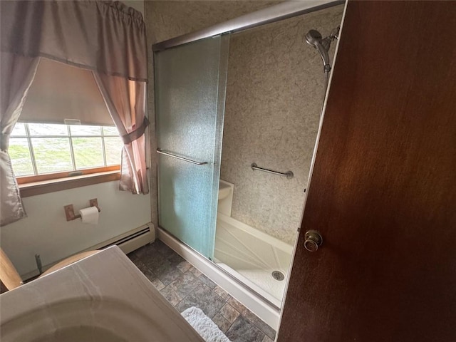 bathroom featuring an enclosed shower