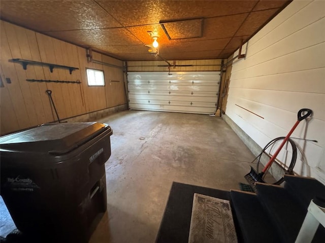 garage with wood walls