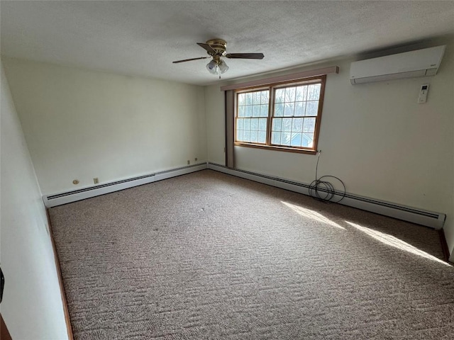 empty room featuring a wall mounted AC, a textured ceiling, baseboard heating, ceiling fan, and carpet