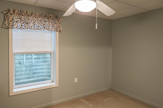 8730 Peffer Rd, Fairview, PA 16415 - spare room featuring healthy amount of natural light, baseboards, a paneled ceiling, and ceiling fan