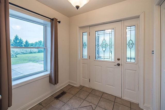 8730 Peffer Rd, Fairview, PA 16415 - foyer entrance with baseboards and light tile patterned flooring