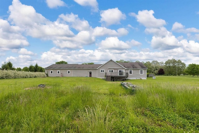 8730 Peffer Rd, Fairview, PA 16415 - rear view of house with a wooden deck and a yard