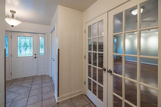 8730 Peffer Rd, Fairview, PA 16415 - foyer entrance featuring french doors and baseboards