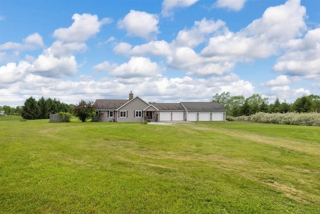 8730 Peffer Rd, Fairview, PA 16415 - single story home featuring driveway, a front yard, a garage, and a chimney