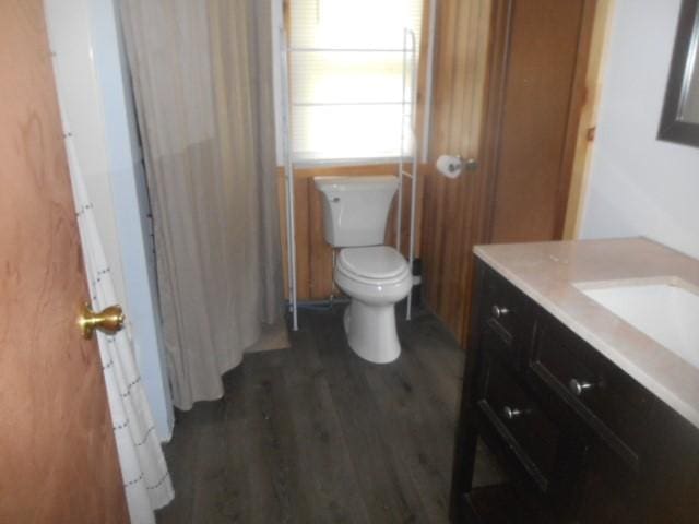 13615 W Ridge Rd, West Springfield, PA 16443 - bathroom featuring toilet, vanity, and wood finished floors