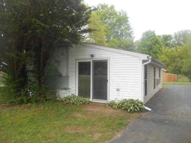 13615 W Ridge Rd, West Springfield, PA 16443 - view of side of home