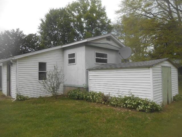 13615 W Ridge Rd, West Springfield, PA 16443 - view of side of property with a yard