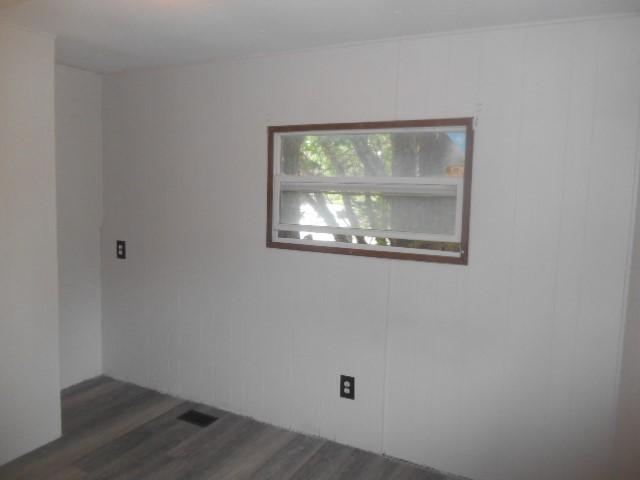 13615 W Ridge Rd, West Springfield, PA 16443 - unfurnished room with dark wood-style floors