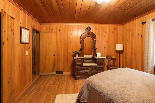 6750 W Ridge Rd, Fairview, PA 16415 - bedroom featuring wooden ceiling, wood finished floors, and wood walls
