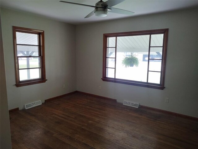 6943 Old Ridge Rd, Fairview, PA 16415 - empty room with dark wood-type flooring and ceiling fan