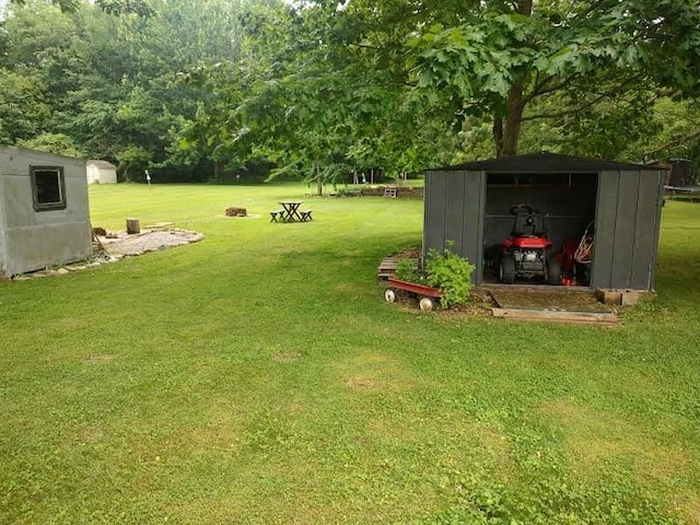 6943 Old Ridge Rd, Fairview, PA 16415 - view of green lawn with a storage unit