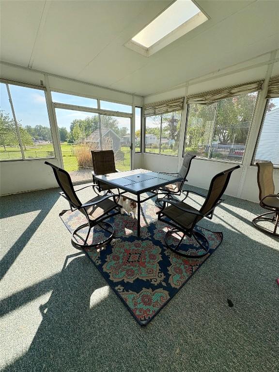 4224 Amherst Rd, Millcreek, PA 16506 - sunroom featuring a skylight and outdoor dining space