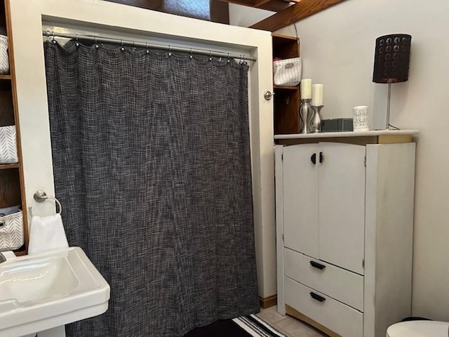 bathroom with sink and toilet