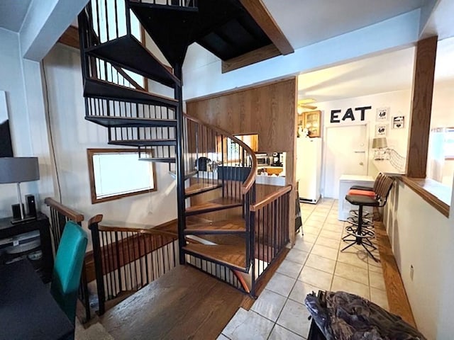 stairs with tile patterned flooring