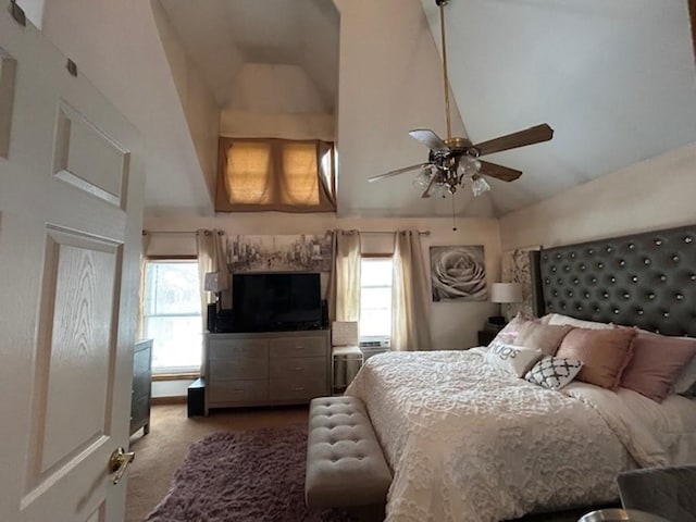 bedroom with lofted ceiling and ceiling fan