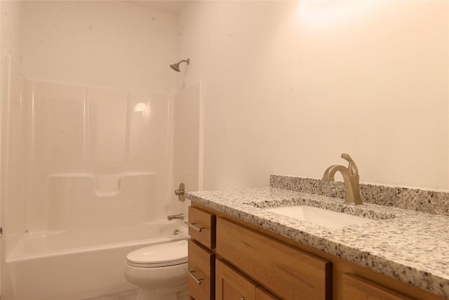 full bathroom featuring vanity,  shower combination, and toilet