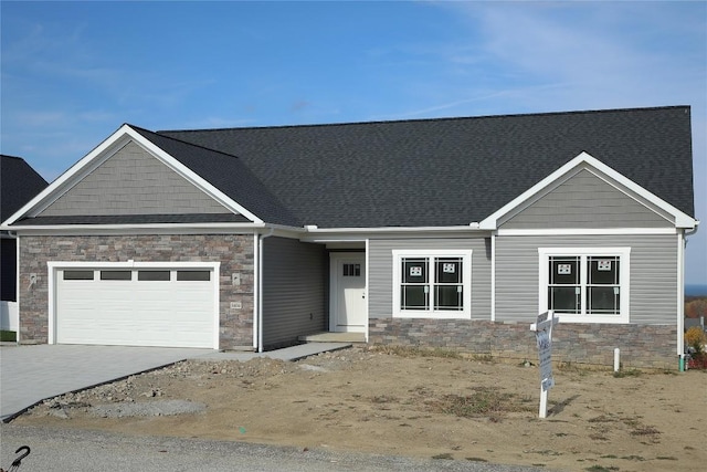 craftsman-style home with a garage